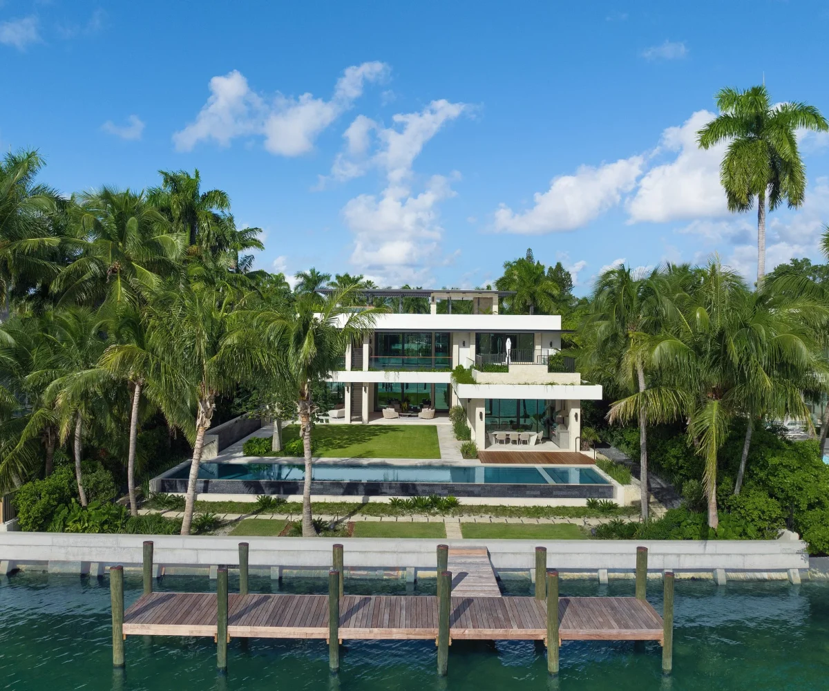 Luxury beachfront estate on Palm Island in Miami Beach with private dock and bay views