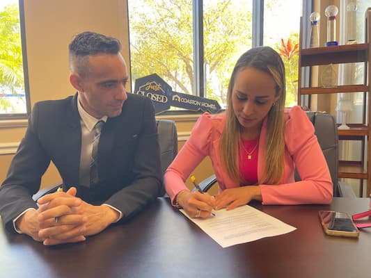 Real Estate Agent Discussing Financing US Prime Realty