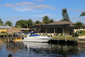 Visit our Cape Coral Office: Freshwater and Gulf access canal waterfront property in Cape Coral